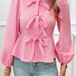 Devine Tied Round Neck Long Sleeve Blouse