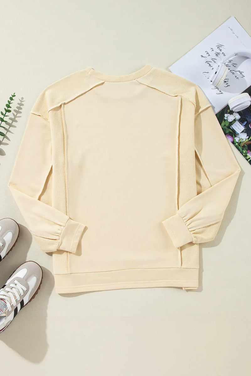 Exposed Seam Round Neck Long Sleeve Sweatshirt