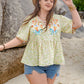 Plus Size Printed Tie Neck Half Sleeve Blouse