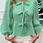 Devine Tied Round Neck Long Sleeve Blouse