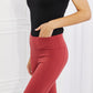 Yelete Ready For Action Full Size Ankle Cutout Active Leggings in Brick Red