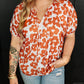 Plus Size Printed Tie Neck Short Sleeve Blouse