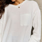 Ninexis Full Size V-Neck Long Sleeve Front Pocket Blouse