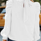 Tied Mock Neck Lantern Sleeve Blouse