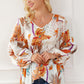 Printed V-Neck Smocked Balloon Sleeve Blouse