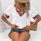 Ivy Lane Eyelet Embroidered V-Neck Short Sleeve Blouse