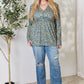 Heimish Full Size Floral Half Button Long Sleeve Blouse