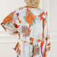 Printed V-Neck Smocked Balloon Sleeve Blouse