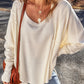 Exposed Seam Round Neck Long Sleeve Blouse