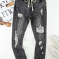 Drawstring Distressed Raw Hem Jeans with Pockets