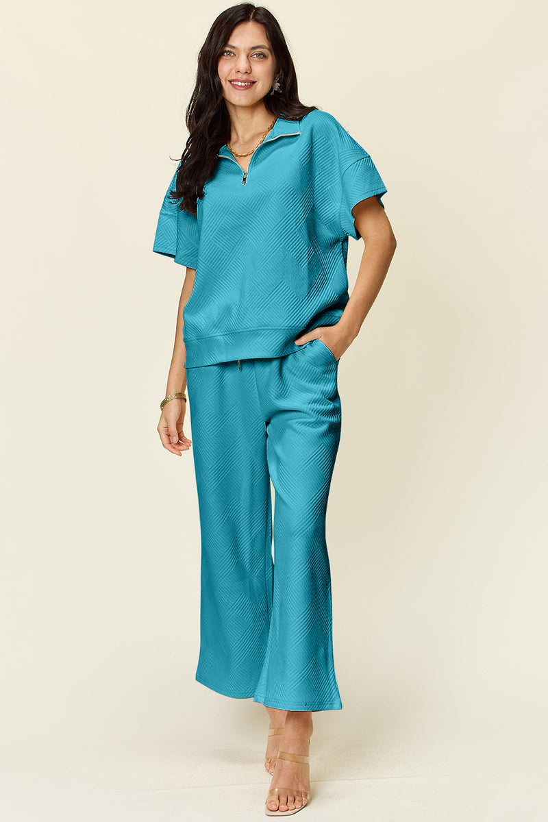 Double Take Full Size Texture Half Zip Short Sleeve Top and Pants Set Light Blue
