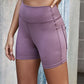 Exposed Seam Decorative Button Yoga Shorts