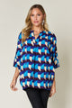 Double Take Full Size Geometric Notched Half Sleeve Blouse Sky Blue