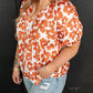 Plus Size Printed Tie Neck Short Sleeve Blouse