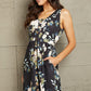 Double Take Printed Scoop Neck Sleeveless Buttoned Magic Dress with Pockets