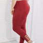 Yelete Ready For Action Full Size Ankle Cutout Active Leggings in Brick Red