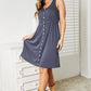 Double Take Sleeveless Button Down Magic Dress