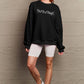 Simply Love Full Size MEET ME AT MIDNIGHT Graphic Round Neck Sweatshirt