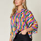 Double Take Full Size Geometric Notched Dolman Sleeve Top