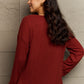 Ninexis Full Size V-Neck Long Sleeve Front Pocket Blouse