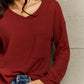 Ninexis Full Size V-Neck Long Sleeve Front Pocket Blouse