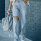 Distressed Asymmetric Waist Jeans