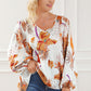 Printed V-Neck Smocked Balloon Sleeve Blouse