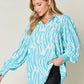 Double Take Full Size Printed Smocked Long Sleeve Blouse