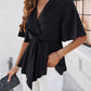 Devine Surplice Tie Waist Half Sleeve Blouse