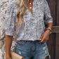 Perfee Printed Notched Half Sleeve Blouse