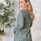 Heimish Full Size Floral Half Button Long Sleeve Blouse