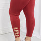 Yelete Ready For Action Full Size Ankle Cutout Active Leggings in Brick Red