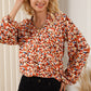 Printed Notched Balloon Sleeve Blouse